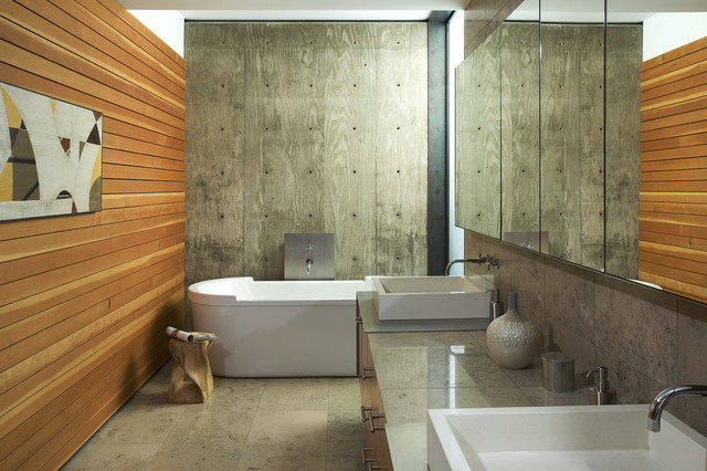 Byrnes residence Phoenix wood panels bathtub exposed concrete at home
