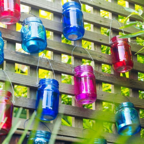 Tuin decor bloemen kleurrijke glazen lantaarns rooster