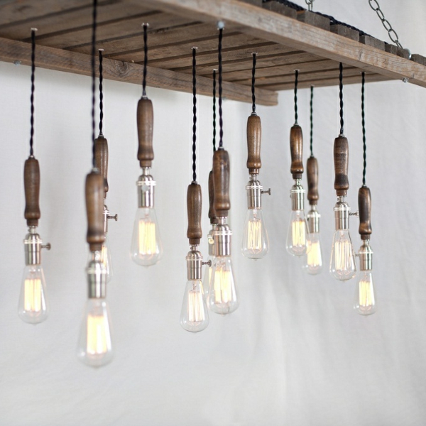 Wooden pallets in the garden use hanging light bulbs