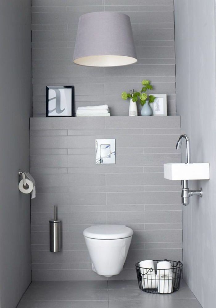 Банята за гости проектира малка баня с минималистичен дизайн
