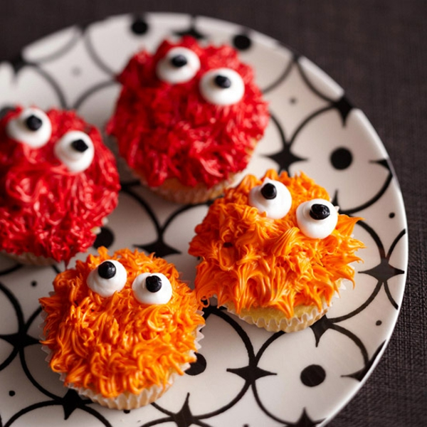 Scary muffins ψήνουν αποκριές ζαχαροπλαστικής cupcakes πορτοκαλί