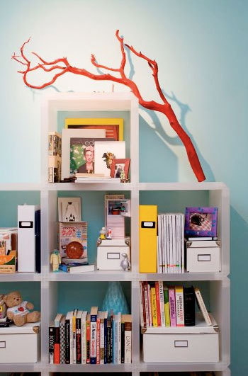 Interior decoration with branches red bookshelves nursery design