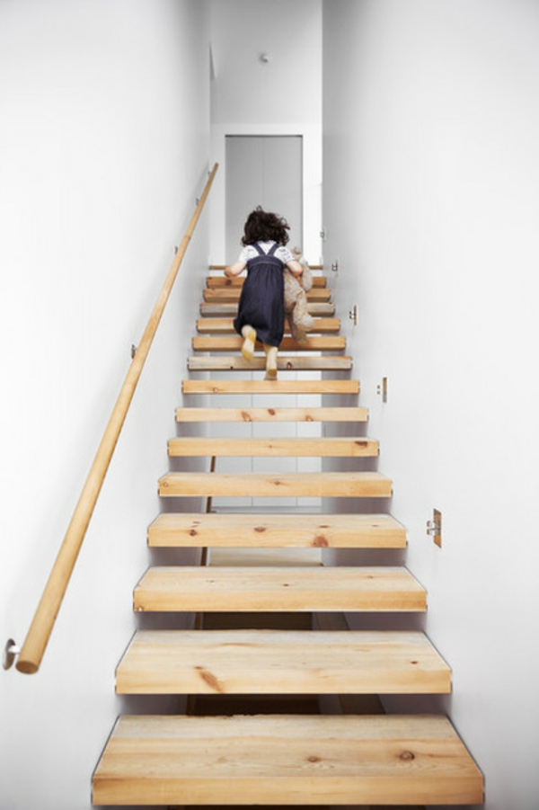 Modern wooden stair railings floating children
