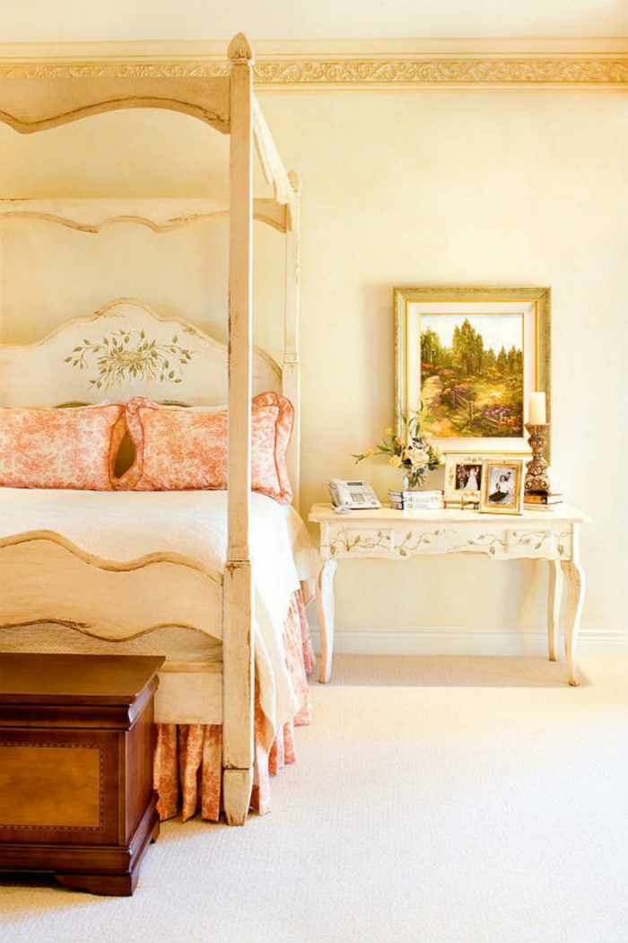 Bedroom set up with four poster Victorian style antique furniture