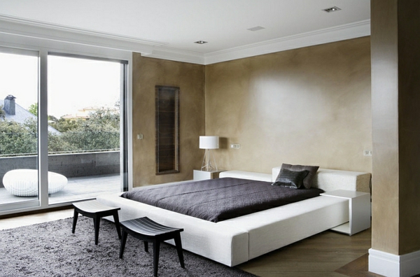 Ložnice minimalistický nábytek stolička koberec měkký