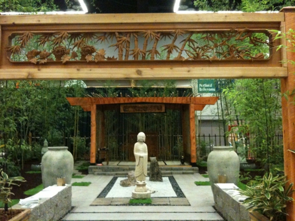Zen garden mooring Japanese plants. Concrete plates