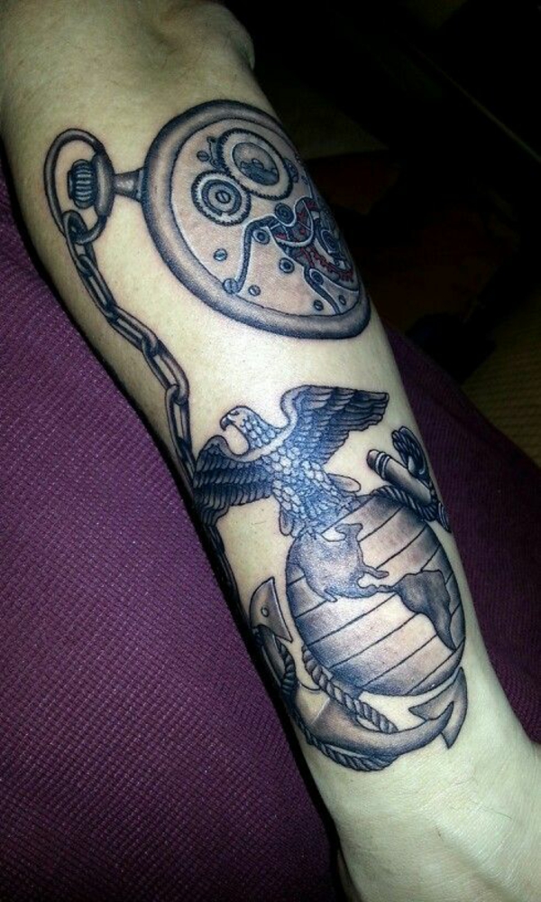 eagle earth globe anchor tattoo forearm