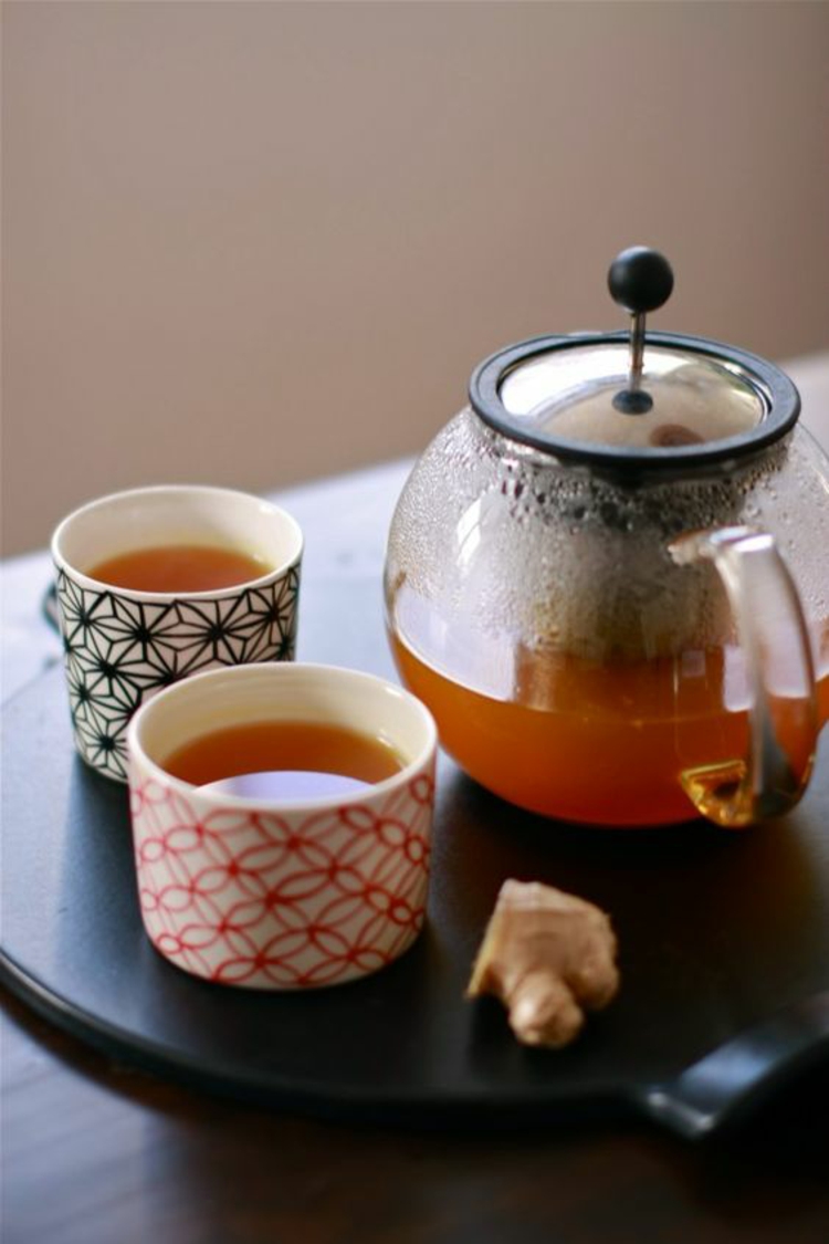 Asiatisk indflydelse og indisk køkken tilberedning gurkemeje te