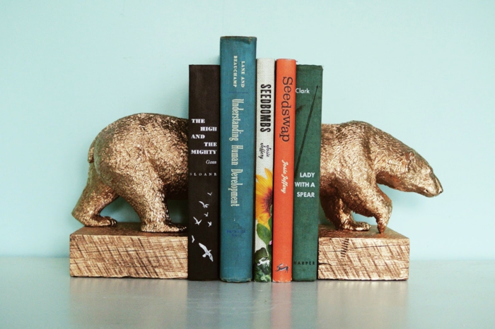 رف الكتب الدكان الذهبي الدب الخشب
