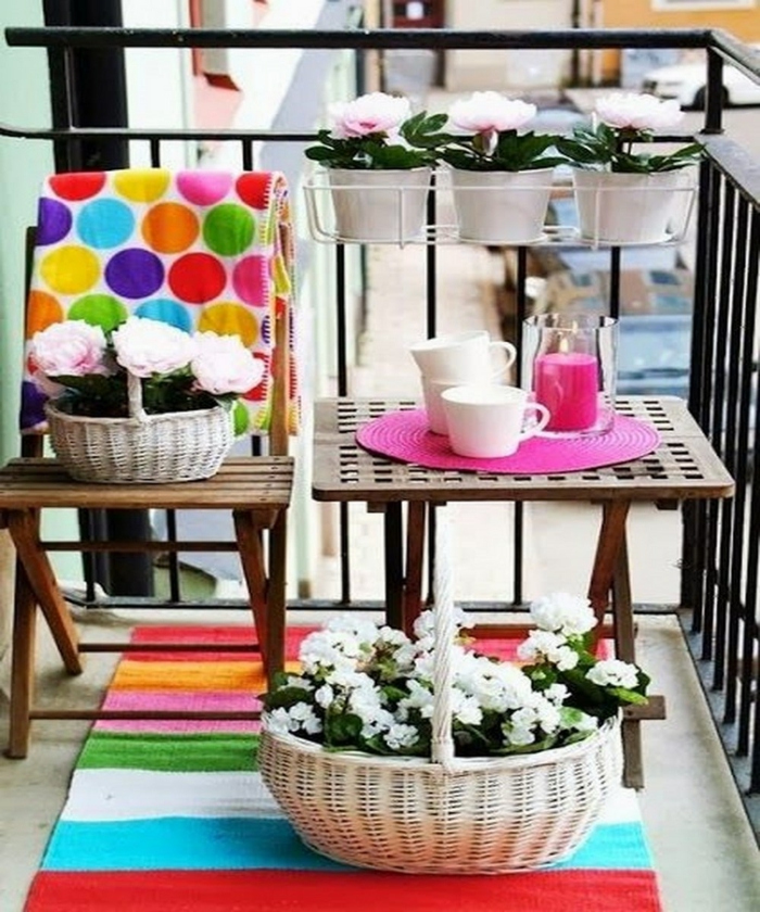 balcony deco ideas folding chair folding table striped runner dotted wool blanket