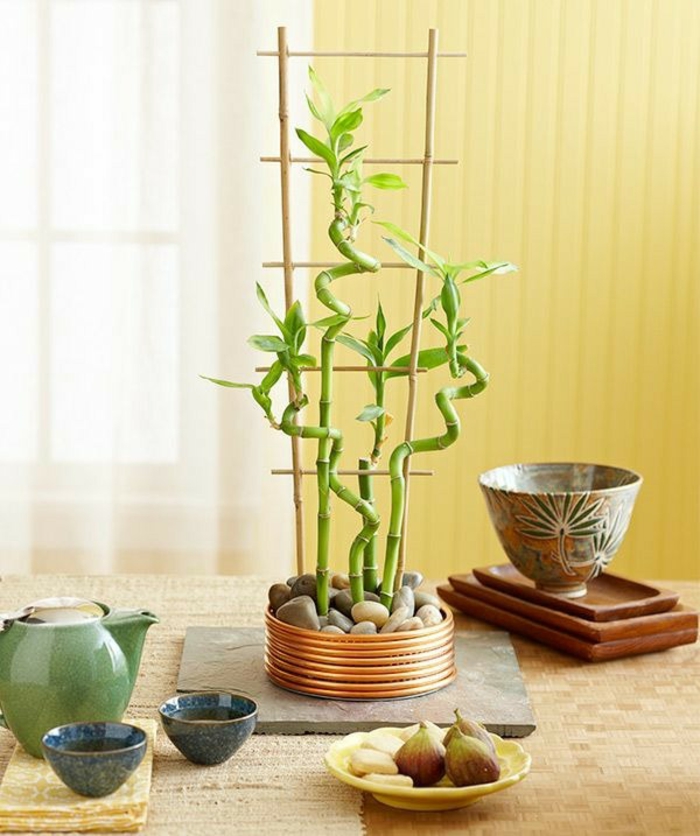 bambou décoration bambou bâtons idées maison accessoires décoration de table cailloux thé boisson