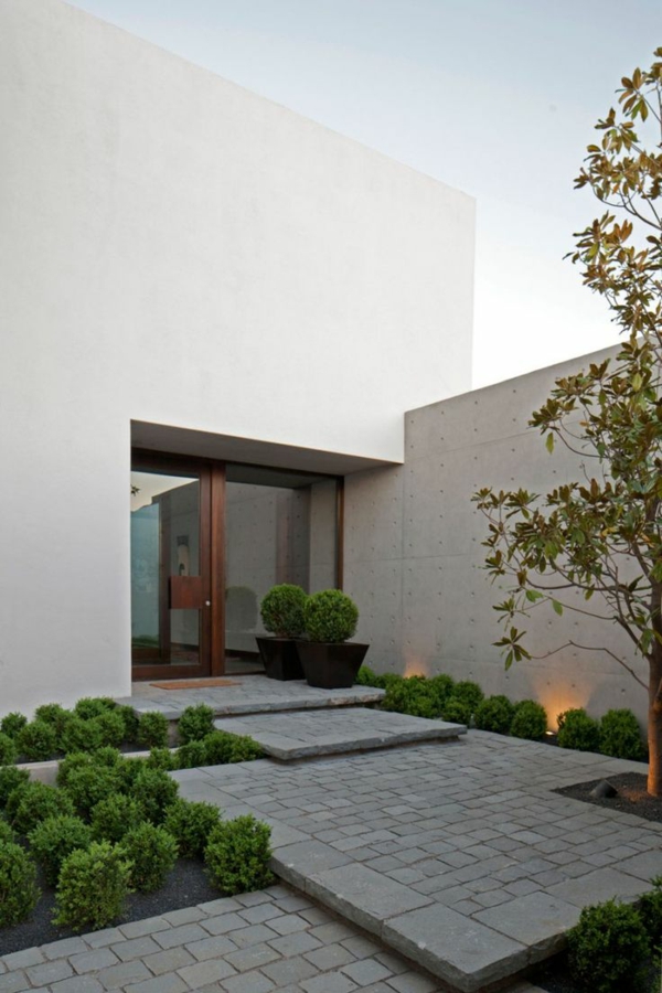 exemples de pavés en pierre de conception de jardin moderne sont intervenus
