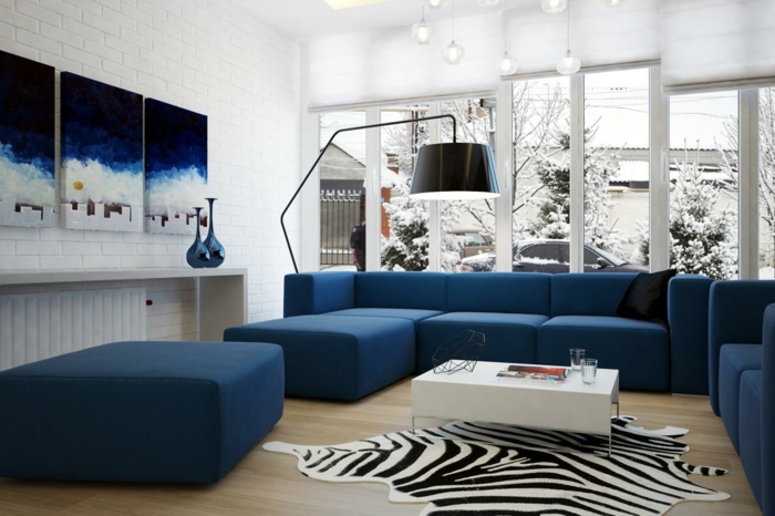 blauwe sofa hoekbank zebra tapijt