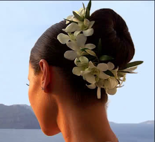 brude frisurer med blomsterdukke med orkidékrans