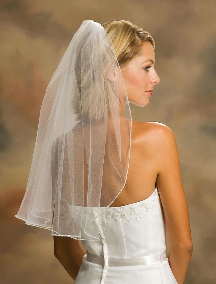 brude frisurer med slør Vintage bryllup ideer forlænger optisk dit hår