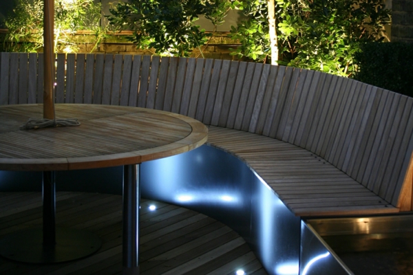 beautiful roof terrace design wood bench table round indirect lighting