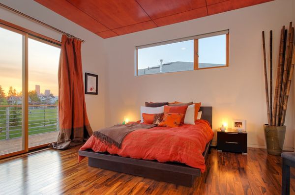 Cool soveværelse palette accenter oransje dyner