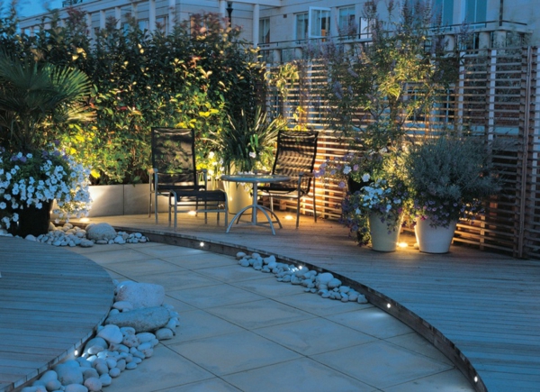 Roof terrace design lighting on the balcony planting protection of pebbles