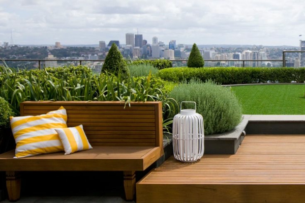 rooftop roof design lawn wooden bench city view