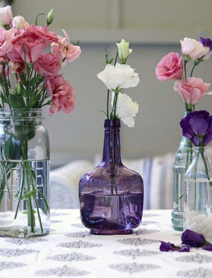 bouteilles déco bouteilles en verre décoration florale idées de table