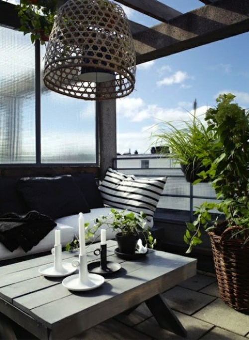 Roof terrace furnishing cool view candles wooden table