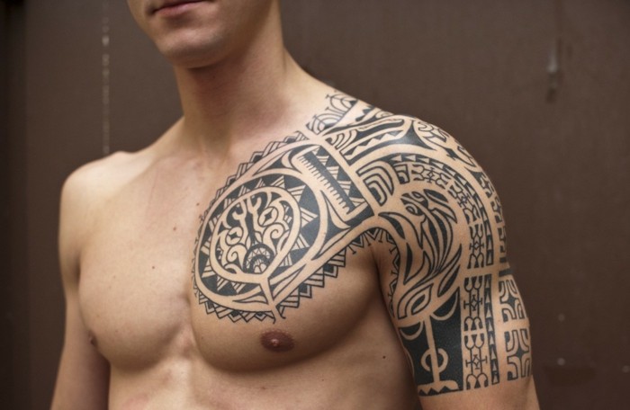ekte motiver tribal tatovering øvre arm