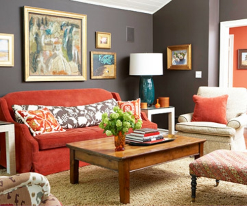 优雅的客厅家具黑色墙壁绘画红色沙发