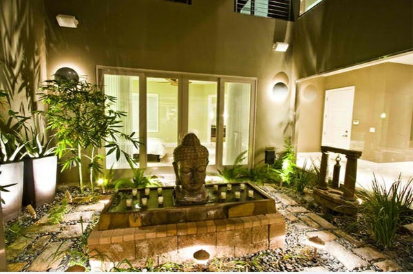 exterieur ideeën aziatische tuin patio deco kaarsenplant