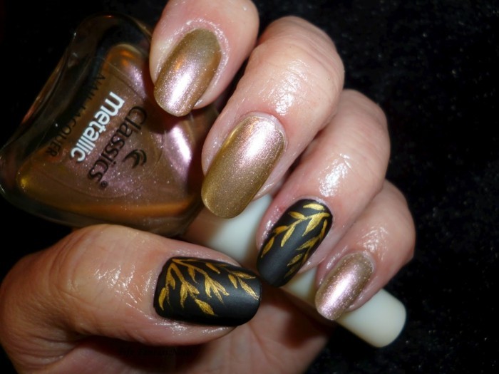 diseño de uñas otoño negro dorado