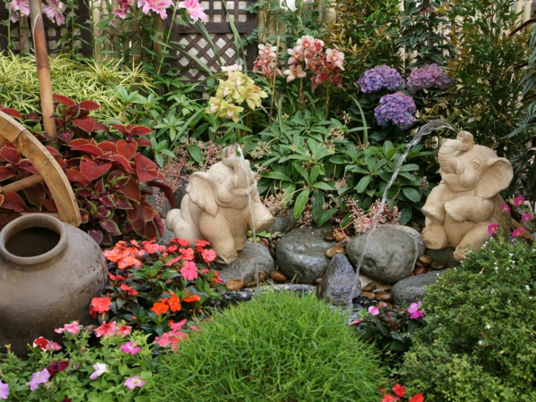 градински идеи градинарство камъни трайни насаждения градински растения слон фигурки фонтан