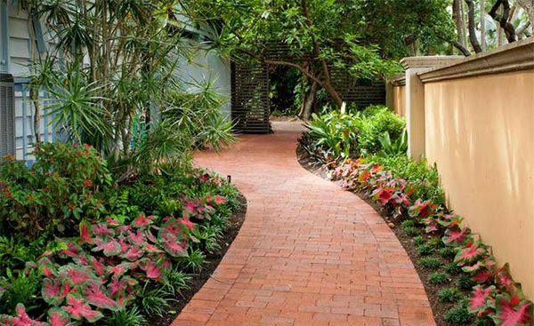 garden landscaping with brick entrance way yard