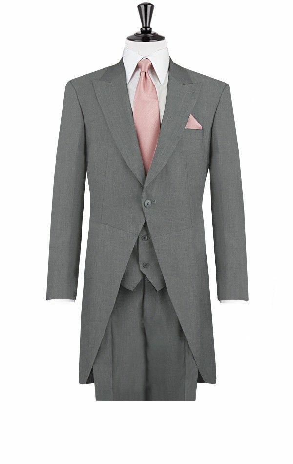 traje de boda para hombre gris lazo rosa novio