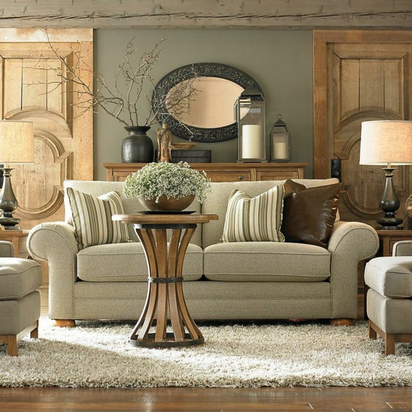 trebjelke stue rustikk stue møbler tre salongbord rund sofa