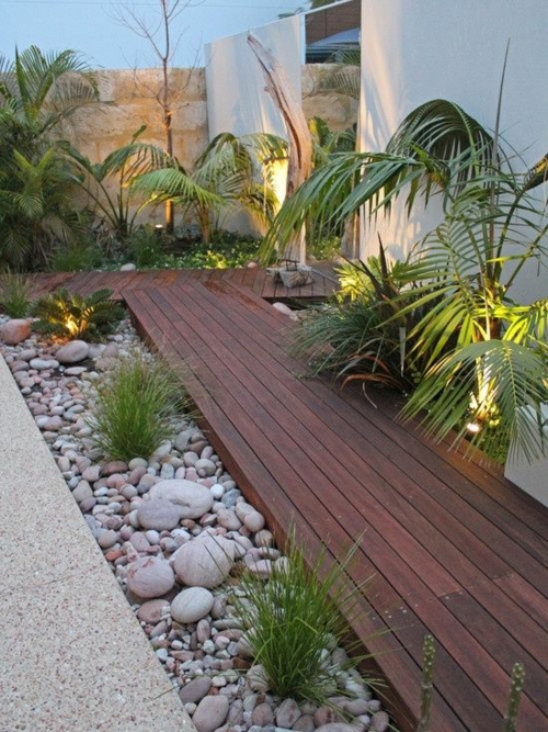 houten tegels leggen van kiezels terras tuinverlichting