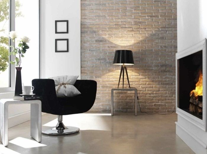 идеи за стена дизайн идеи за живеене хол камина черно кресло тухлена стена