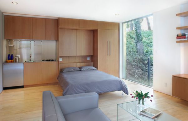интелигентни дизайн със сгъваемо легло, работещи сиво и светло дърво