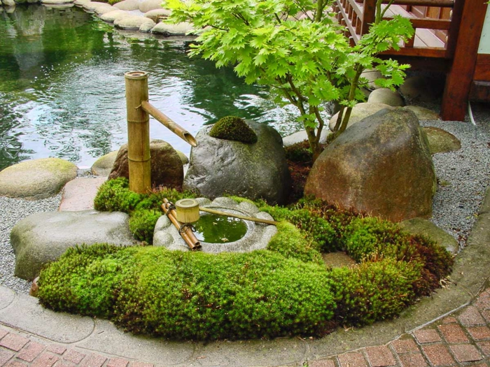 ιαπωνική κήπο μπαμπού κρήνη σχήμα φυσική πέτρες κήπο λίμνη πράσινα φυτά