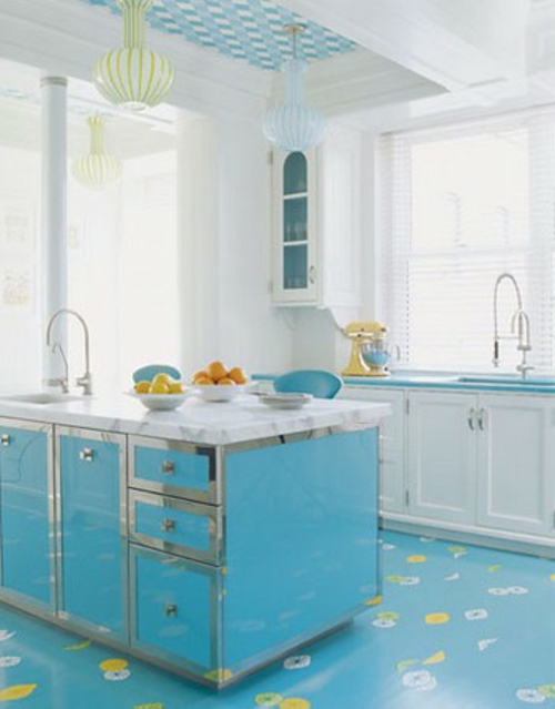 kitchen island in turquoise with shiny metal edges