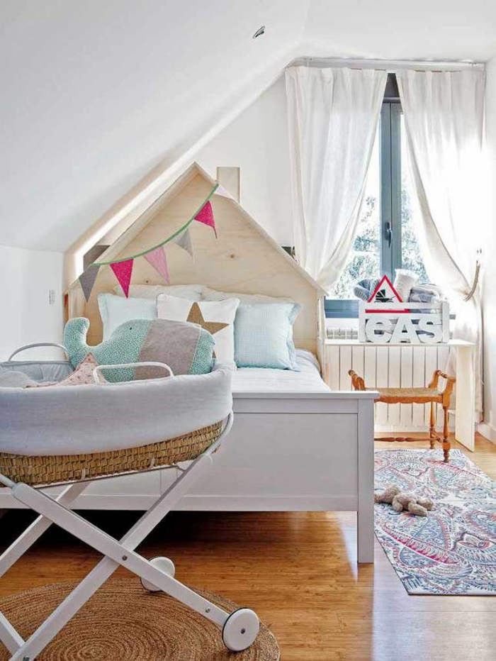 nursery with sloping cradle mobile diy headboard nursery rug colorful