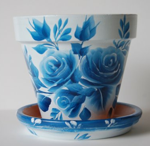 creatieve bloempotten blauwe rozen