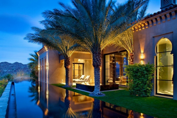 Moroccan house infinity pool and palm trees