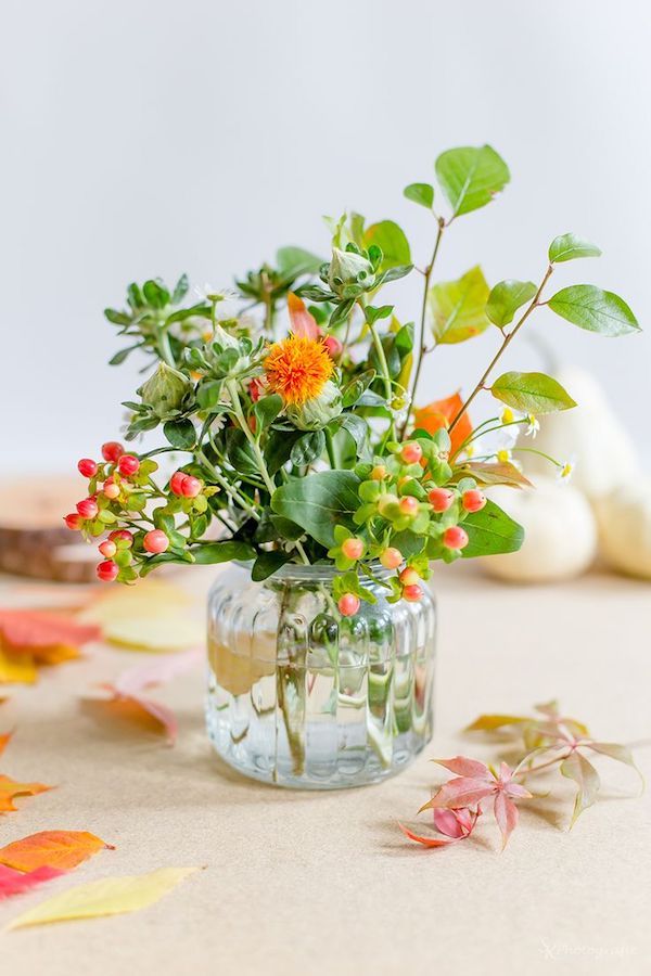 tinker with branches and floral table decorations