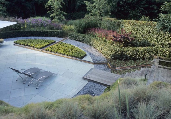 Μοντέρνα παραδείγματα σχεδιασμού κήπου από πέτρινο πάτωμα