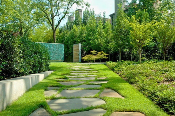 conception de jardin moderne avec jardin en pierre encadrant l'aménagement paysager de jardin avec des pierres jardinage paysage