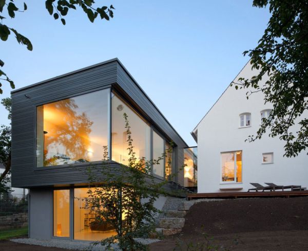 Модерни къщи удължаване геометрични форми осветление прозорец