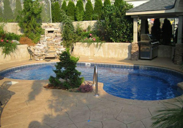 kidney shaped pool in garden outdoor furniture outdoor kitchen
