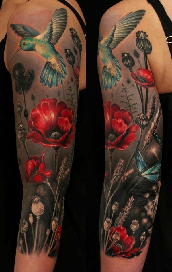 upper arm tattoo tribal floral nature