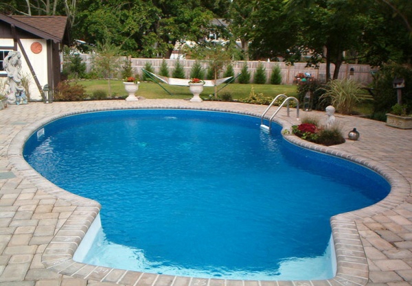 pool in the garden kidney shaped gardening ideas swimming pool