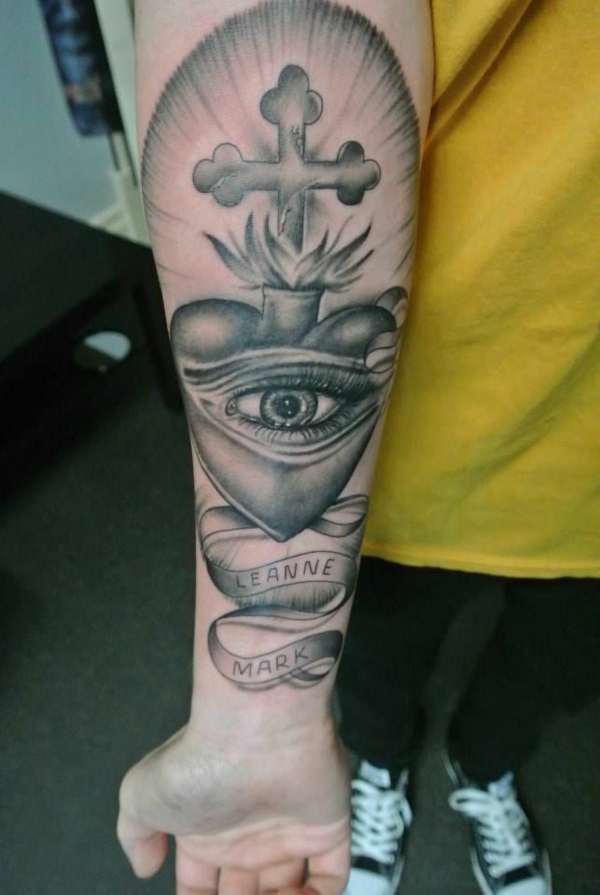 tattoo forearm motifs cross eye
