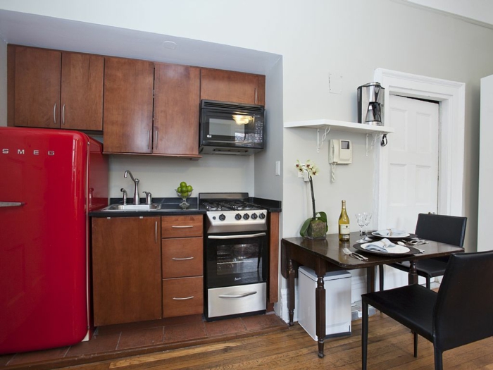 retro fridge red design set up small kitchen